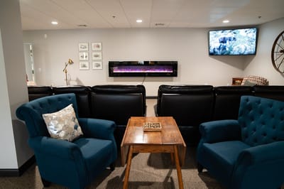 Comfortable lounge area with seating and fireplace