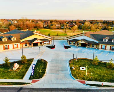 Aerial view of the Mapleton Assisted Living building and parking area