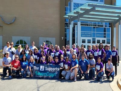 Group of people outside a building at an event