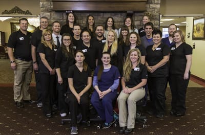Group photo of staff members in the facility