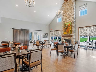 Bright dining room with tables and chairs