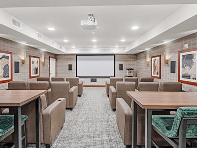 Bright common area with seating for residents