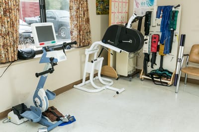 Physical therapy equipment in a facility room