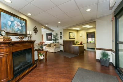 Welcoming lobby area with seating and fireplace