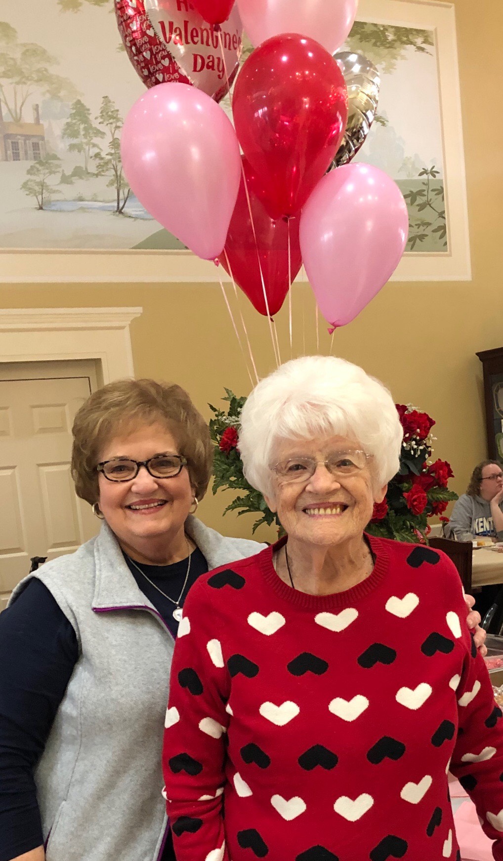 Residents enjoying a festive celebration with balloons
