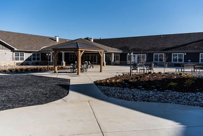 Outdoor seating area with gazebo and pathway