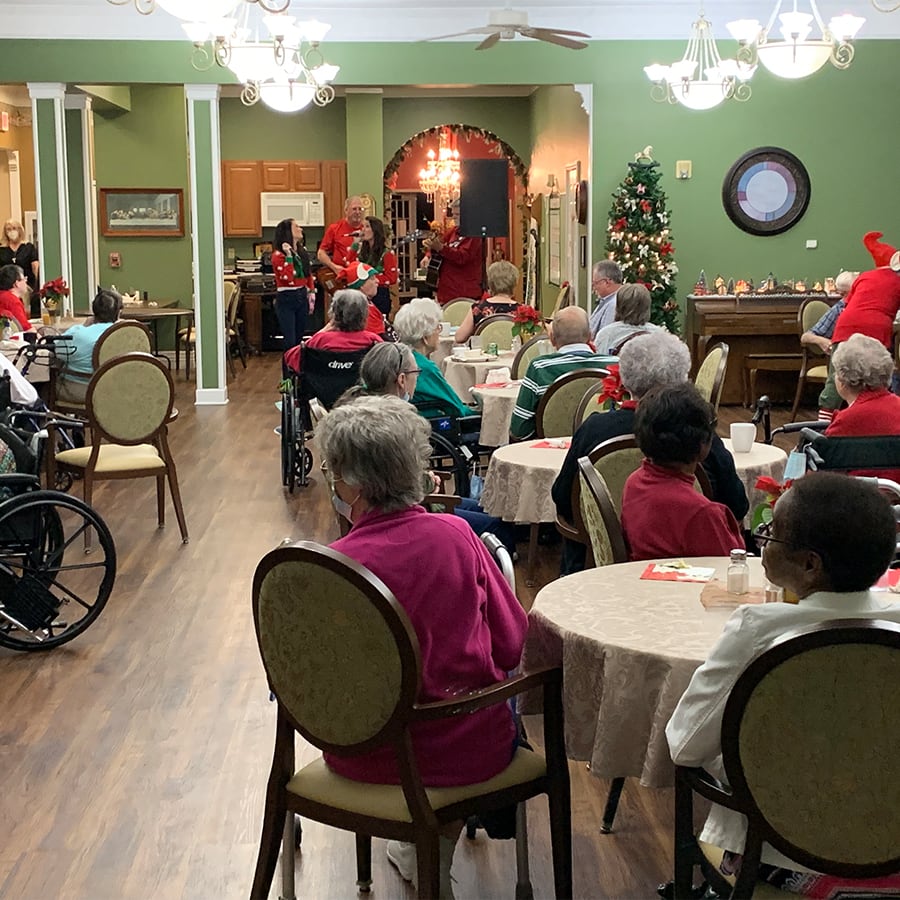 Residents enjoying a festive celebration in the common area
