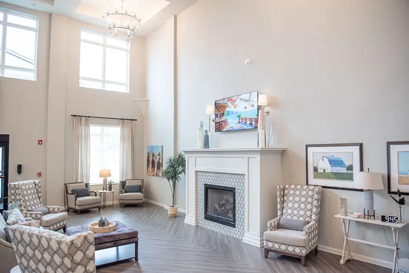 Lobby area of a senior living facility with seating and decor
