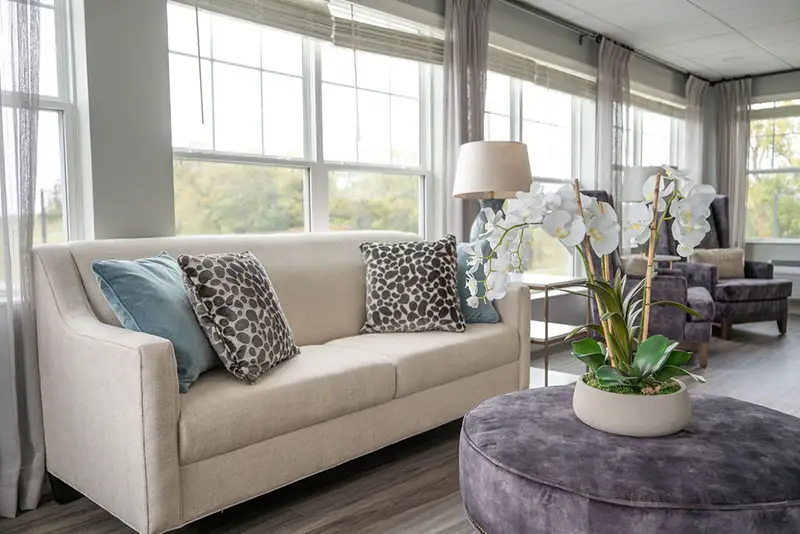 Cozy common area with seating and natural light