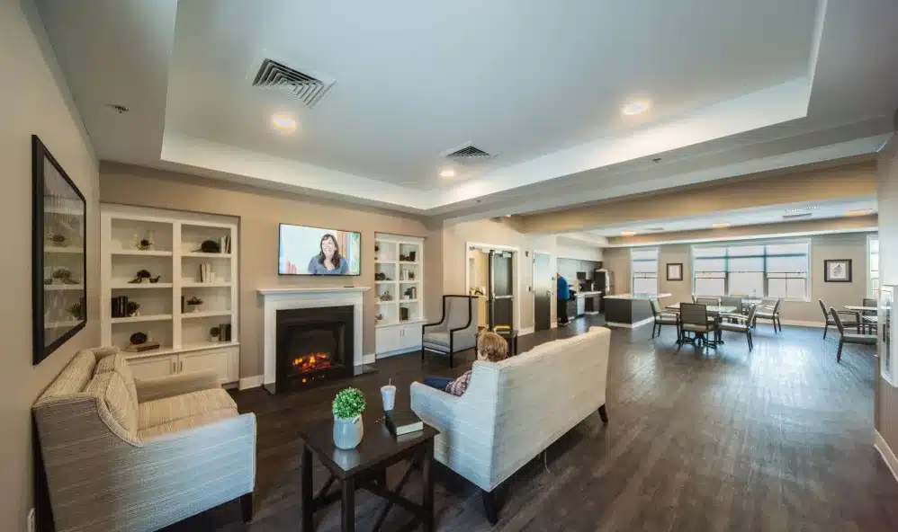 A cozy common area with residents lounging
