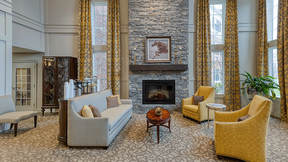 Cozy common area with seating and fireplace
