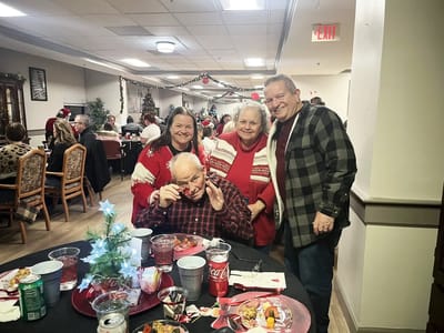 Residents celebrating together at a holiday dinner event