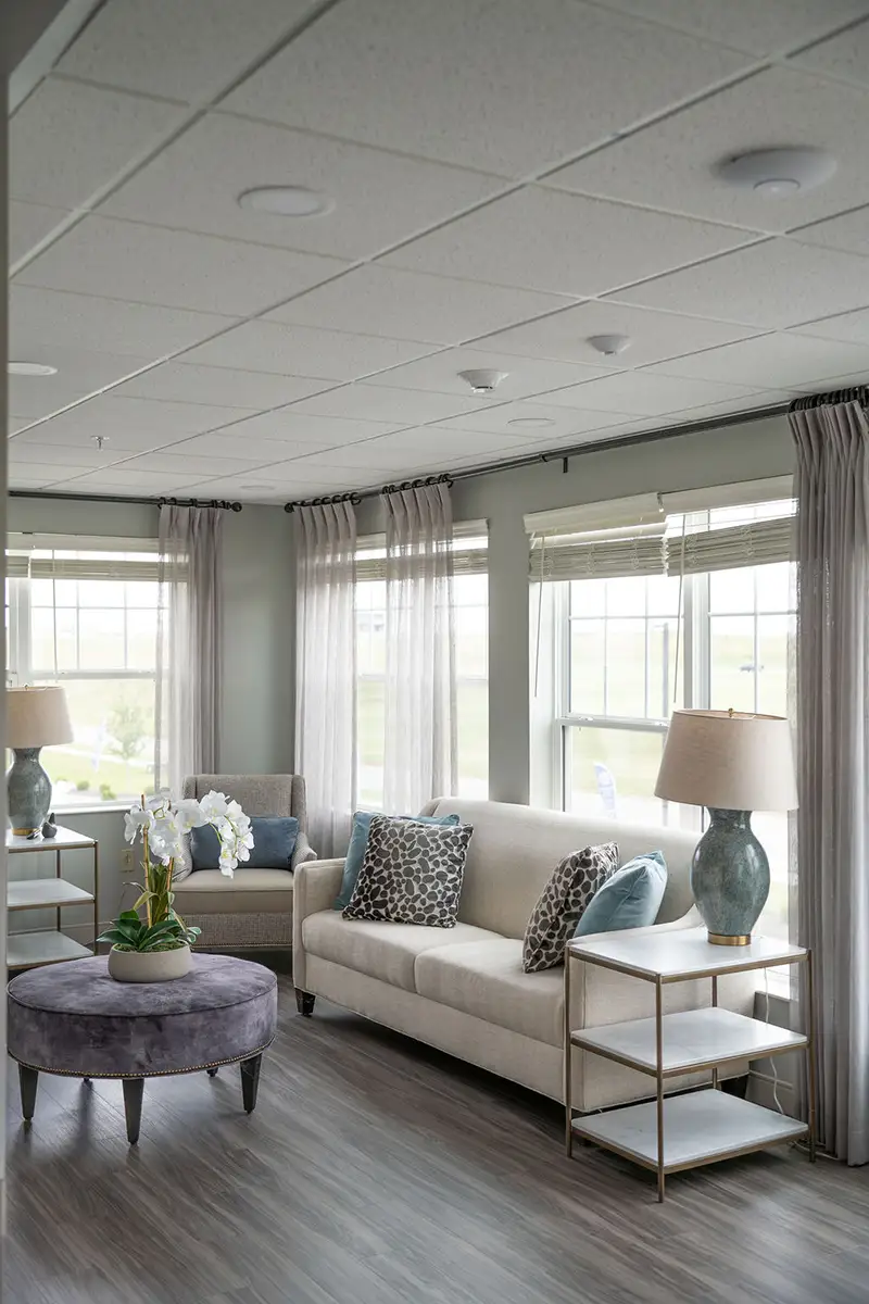 Cozy common area with comfortable seating and natural light