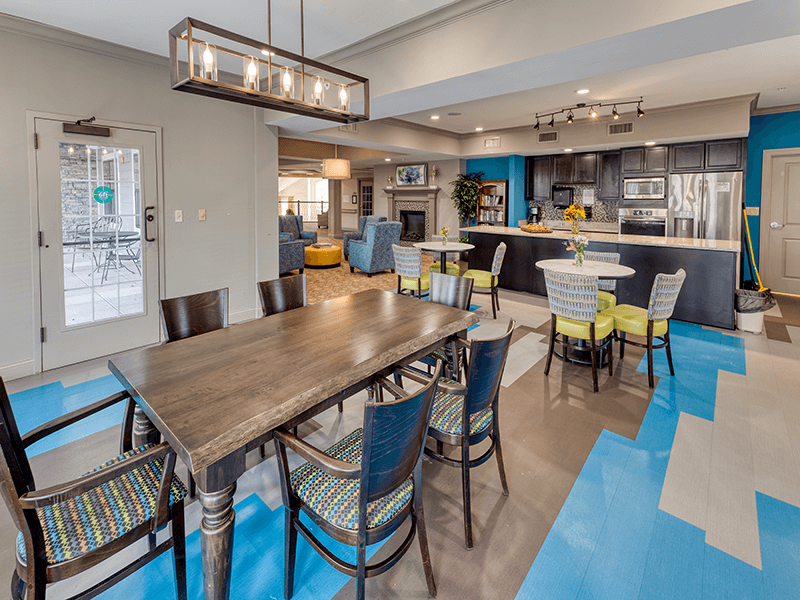 Bright interior common area with seating and tables