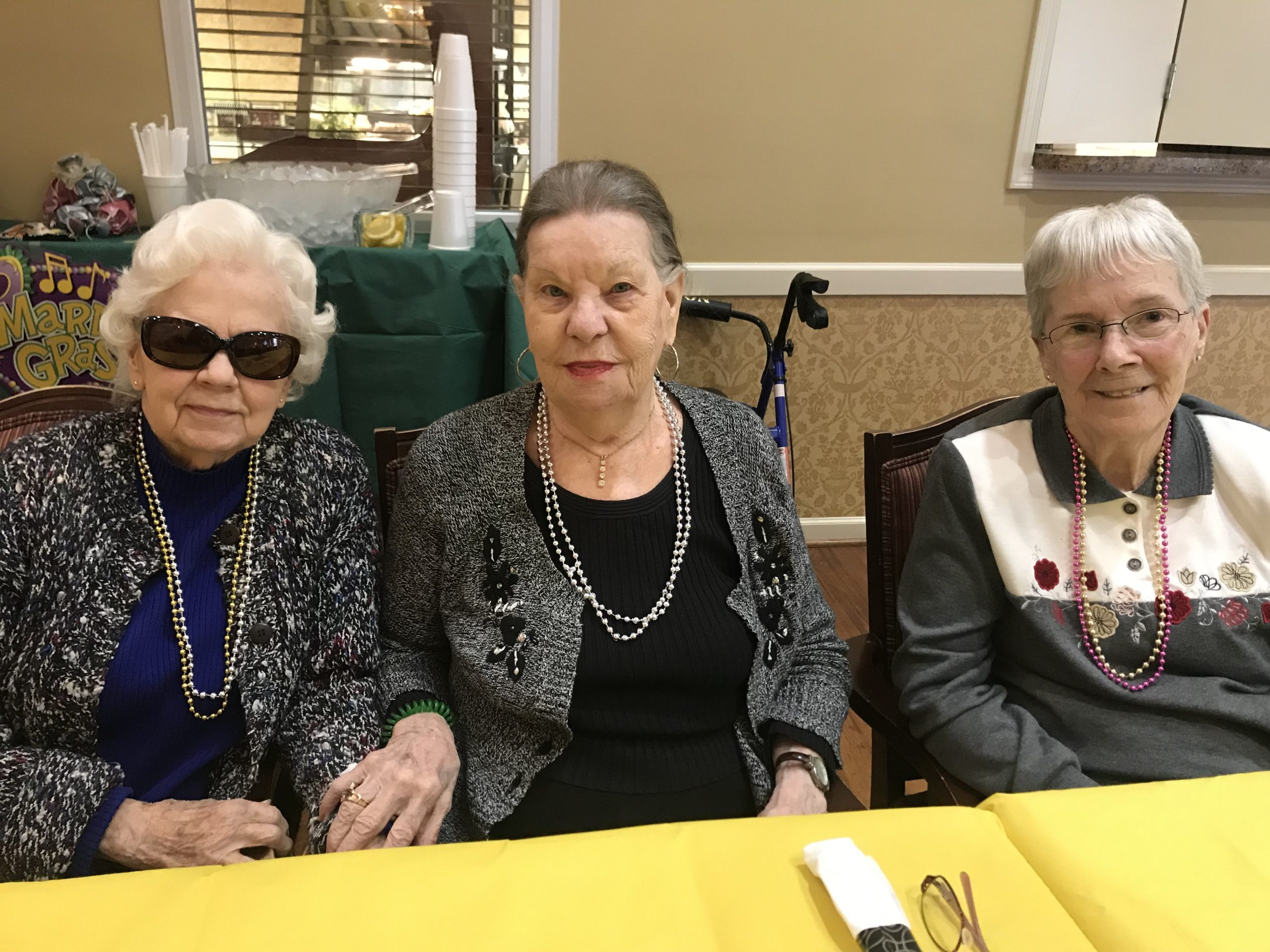 Three residents enjoying a social event