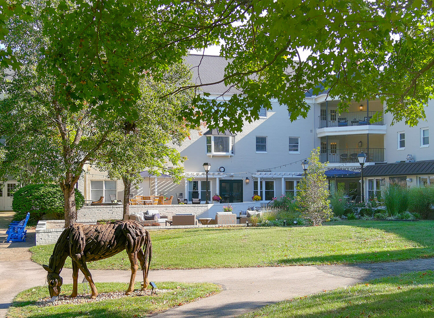 Outdoor view of the facility with gardens and seating areas