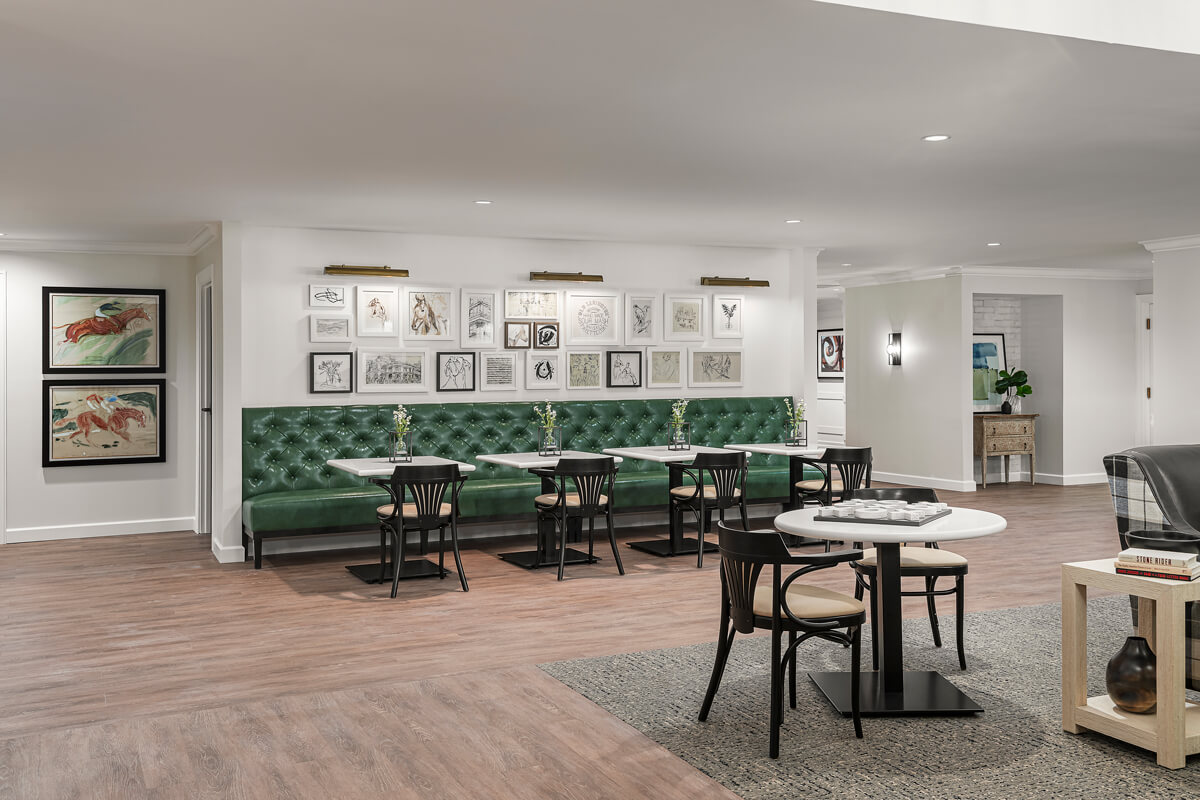 Bright common area with seating and artwork