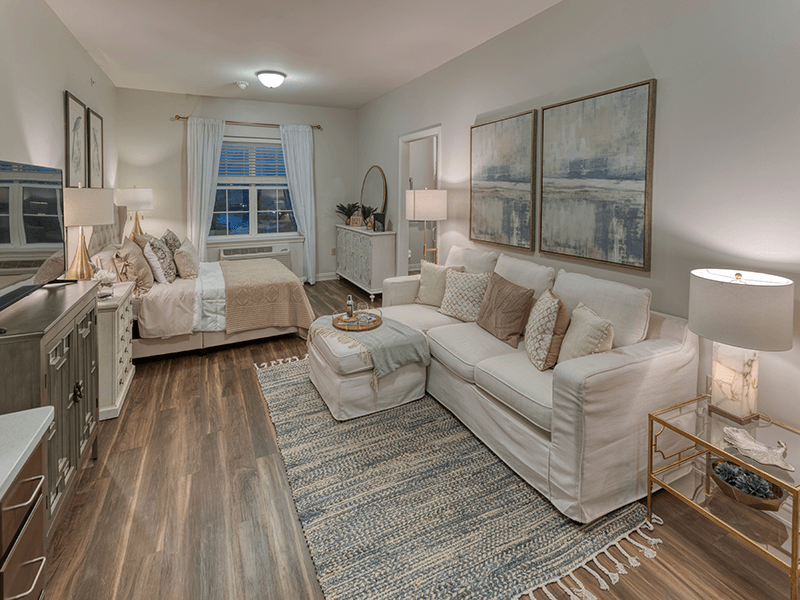 Cozy and well-decorated resident room with a sitting area