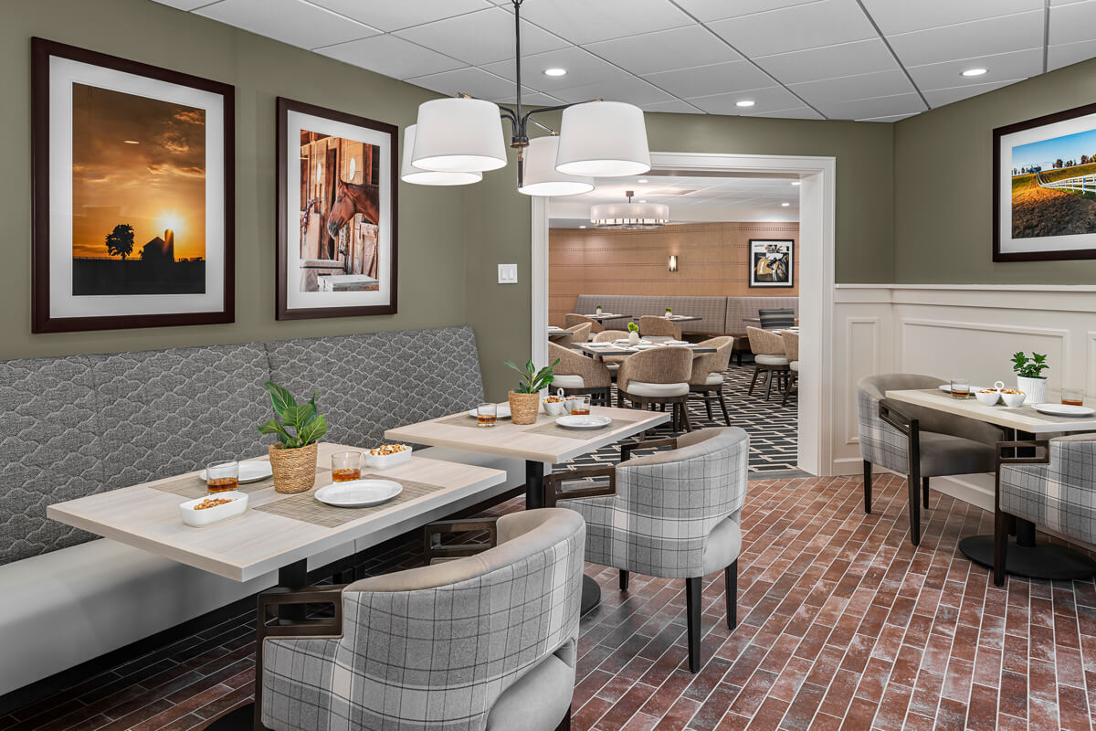 Dining space with tables and seating in a warm atmosphere
