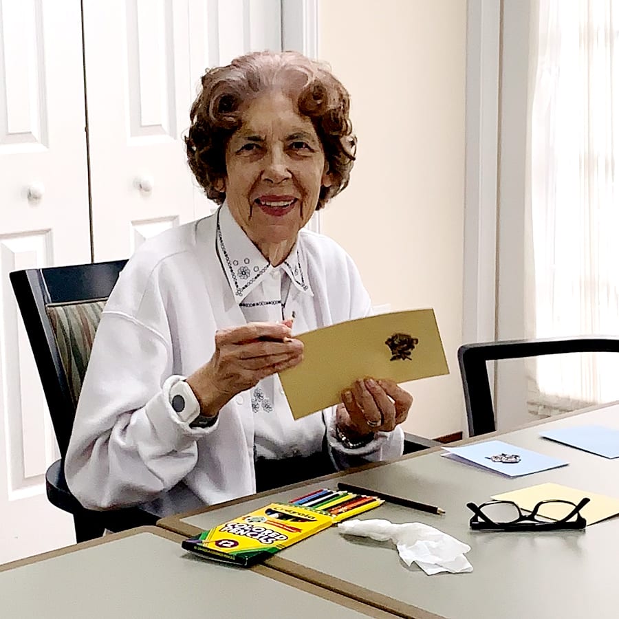 Resident engaged in arts and crafts activity
