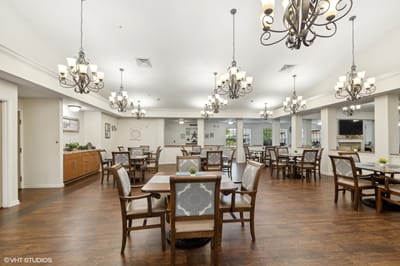 Bright dining room with tables and chairs