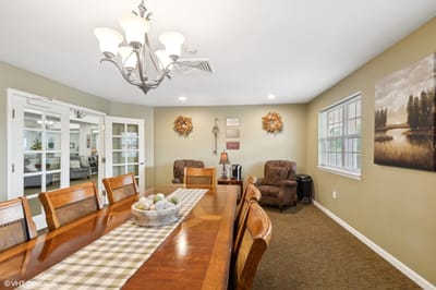 Cozy common area with dining table and chairs