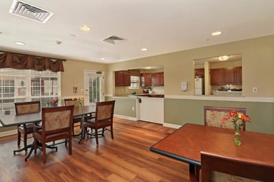 Dining area with tables and flowers on the table