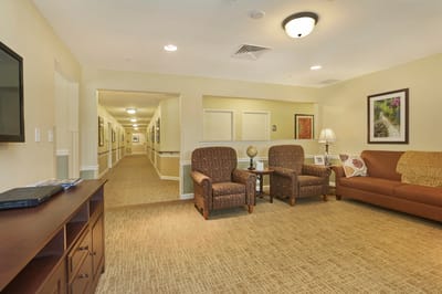 Bright common area with seating and decor