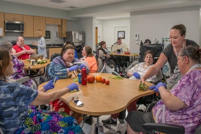 Residents engaged in a group activity in a communal space