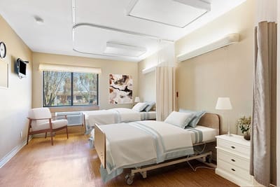 A bright interior view of a shared resident room