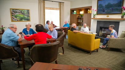 Residents engaging in a group activity in the common area