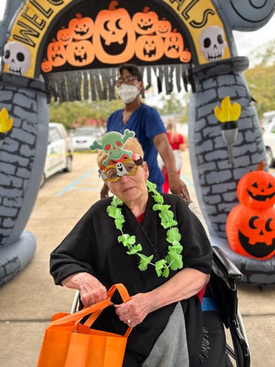 Resident celebrating Halloween with festive decorations