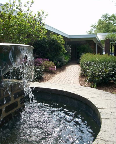 Outdoor area with a water fountain and pathway