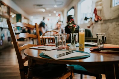 Table set for dining in a cozy common area