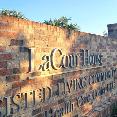 Exterior signage of LaCour House Assisted Living Community