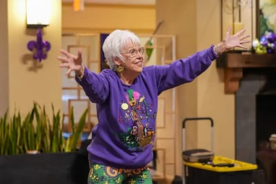 Resident participating in an activity with enthusiasm