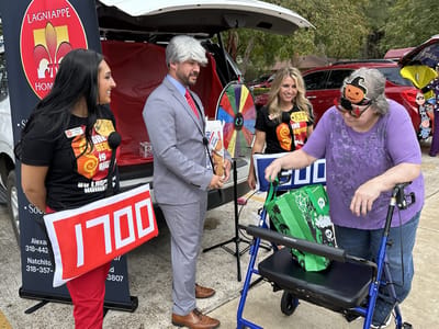 Residents and staff engaged in an outdoor activity event