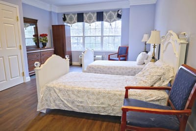 Interior view of a shared resident room with two beds