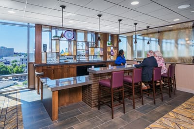 Residents enjoying a social space in the facility