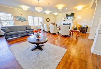 Interior view of a bright common area with seating