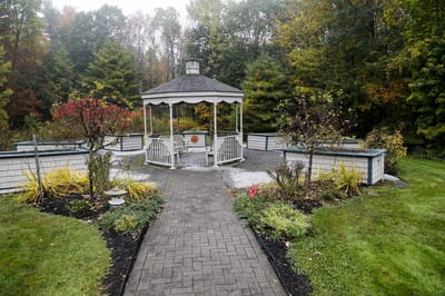 Path leading to a gazebo in a garden