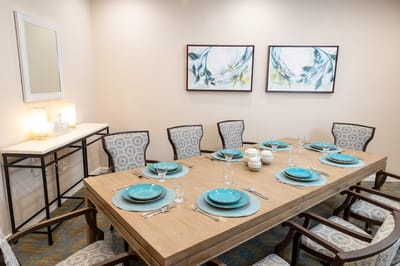 Well-set dining table in a modern dining area