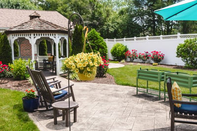 Peaceful outdoor area with seating and flowers