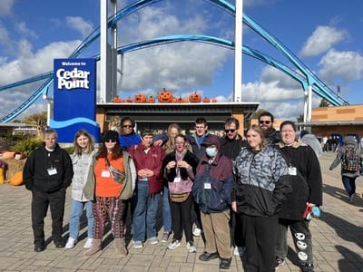 Group of people at an amusement park entrance