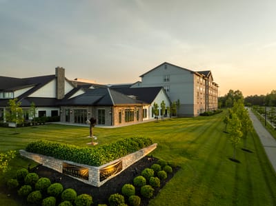 Exterior view of Clarendale Ann Arbor with landscaped gardens