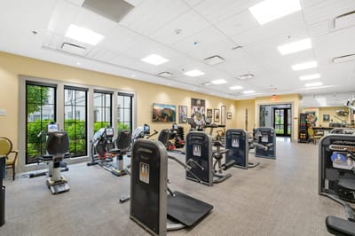 Interior view of a fitness center with exercise equipment