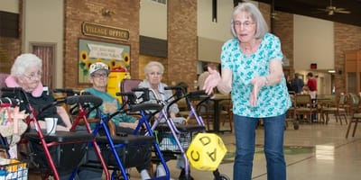 Residents participating in an activity inside the facility