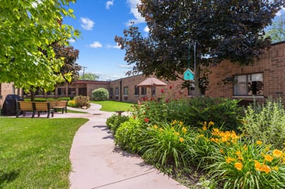 Beautiful garden area with walking path and seating