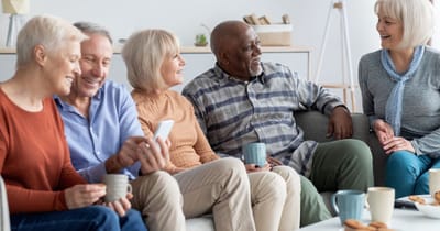Residents enjoying conversation in a common area