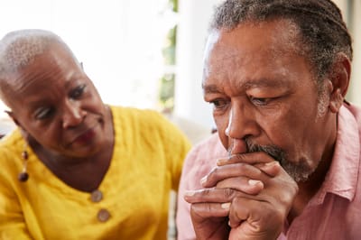 Residents engaged in a thoughtful conversation